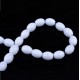 Oval glass beads 11x8mm Milk white